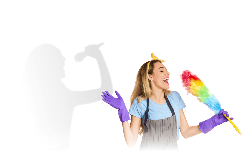 A fan singing into a feather duster with a performer shadow on the wall
